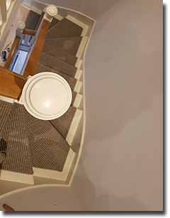 Unnatural Flooring New England woven sisal look alike vinyl carpet fitted as a bespoke stair runner
